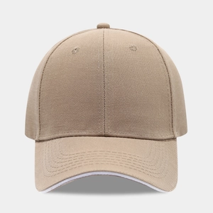 Classic khaki six-panel cotton baseball cap with white sandwich brim and curved visor