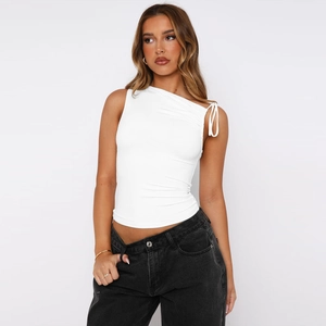 Detail of white asymmetric neck cropped top with side drawstring ruching design