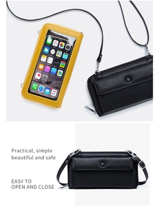 Macro detail of litchi texture on crossbody phone bag with clear touch screen window