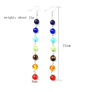 Detail view of 11cm seven chakra stone tassel earrings with 8mm multicolor beads