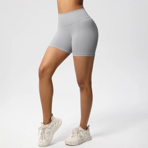 Detailed view of seamless high-waist grey yoga shorts with scrunch butt lift feature