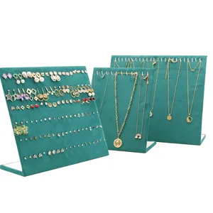 Three-piece emerald green velvet jewelry display stands for earrings and necklaces