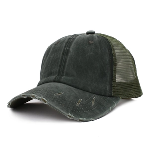 Detail of washed cotton trucker hat with distressed brim and breathable mesh back