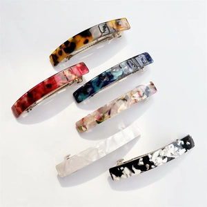 Detailed set of six marble texture acetate hair clips in various elegant patterns