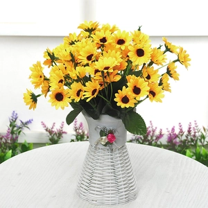 Artificial yellow sunflower in a white textured vase for home and office decor