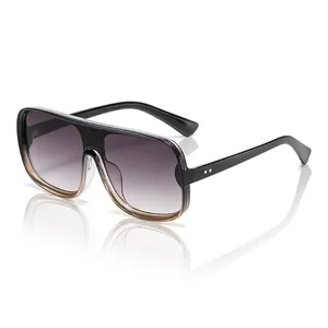 Black and tea gradient oversized aviator sunglasses with stylish metal rivet accents