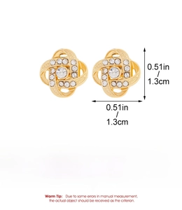 Detail view of golden flower stud earrings with white rhinestones and size measurements
