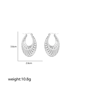 Polished silver croissant earrings with dimensions 3.6cm by 2.6cm and 10.8g weight