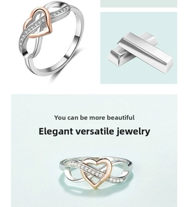 Macro detail of infinity heart ring with silver and rose gold plating and crystal inlay