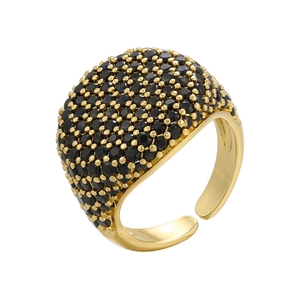 Macro detail of adjustable black zircon wide band ring in gold plated finish