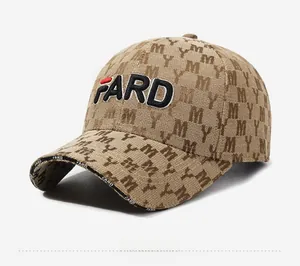 Close-up of FARD 3D embroidery and MY monogram pattern on khaki baseball cap