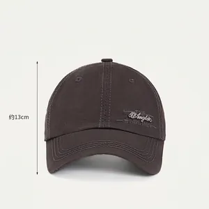 Dark grey cotton baseball cap with 13cm deep fit crown and side metal logo embroidery