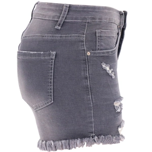 Side view of high-waisted grey denim shorts with distressed details and frayed hems