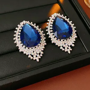 Luxurious French style teardrop earrings with deep blue stone and sparkling crystal pave