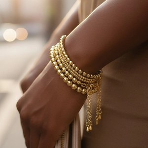 Bohemian gold beaded layered bracelet set with elegant fringe tassels for women