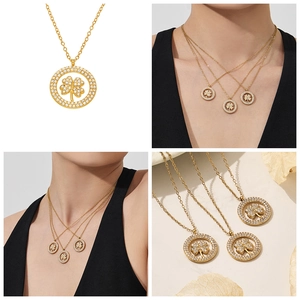 Vue détaillée du collier trèfle à quatre feuilles plaqué or 18k avec zircons brillants