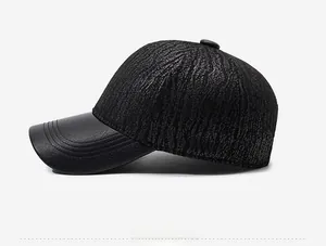 Side view of men's black baseball cap with crackle texture and faux leather brim
