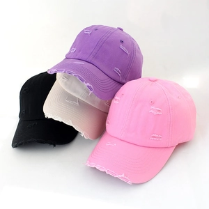 Distressed vintage baseball caps in four colors featuring torn details and soft crowns