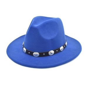 Detail of royal blue fedora hat with black leather band and silver metal embellishments
