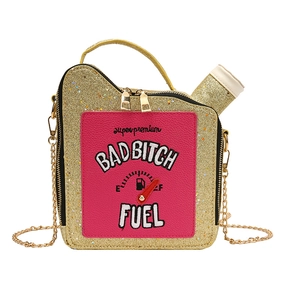 Detailed view of creative gold sequin crossbody bag in oil tank shape with BAD BITCH embroidery