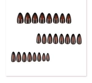 Detail of 24pcs almond shape press-on nails with amber brown gradient and glossy finish
