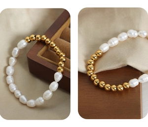 Close-up of baroque pearls and polished 18k gold beads on a classic handmade bracelet