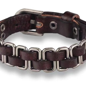 Retro dark brown braided leather bracelet with adjustable metal buckle on white background