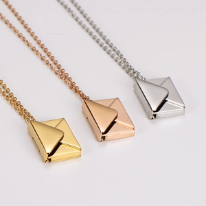 Polished stainless steel magnetic envelope necklaces in gold, rose gold, and silver