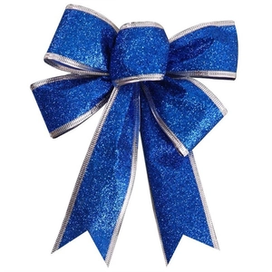Front view of a blue sequined Christmas bow ornament for festive holiday decor