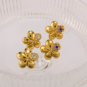 Golden five-petal flower earrings set with clear and colorful zircon crystals