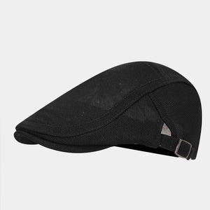 Detail view of black mesh ivy cap with adjustable metal side buckles and breathable texture