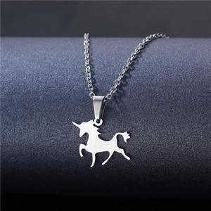 Sleek stainless steel unicorn silhouette pendant necklace for women on a dark grey background