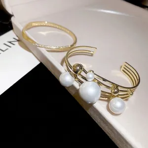 French style gold layered open bracelet with elegant pearls and sparkling rhinestones