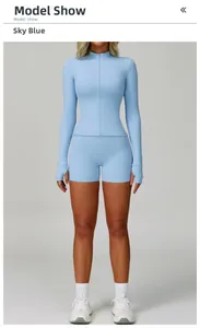 Sky blue long sleeve yoga set featuring thumb holes and high elastic athletic fabric