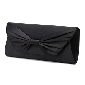 Elegant black satin bow clutch bag for women at a 45-degree angle in minimalist style