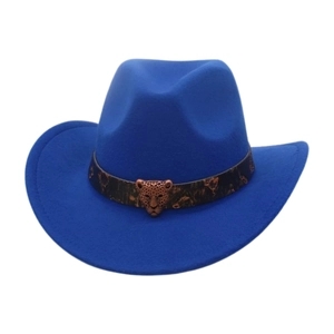 Close-up of royal blue cowboy hat featuring leopard band and bronze leopard head detail