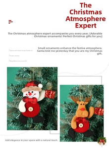 Detail of plush snowman and reindeer Christmas tree ornaments with festive red bows