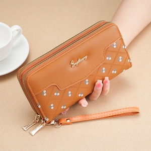 Portefeuille long en cuir marron à double fermeture éclair avec motifs floraux