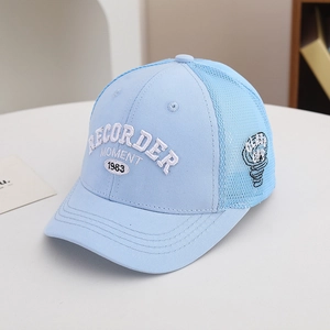 Detail of embroidered letters and breathable mesh on light blue children baseball cap
