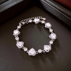 Detail of zircon heart and round bracelet with lobster clasp and S925 silver stamp