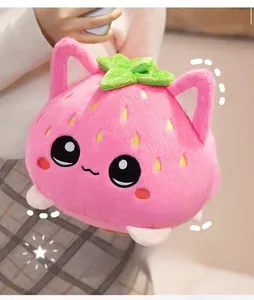 Close-up of pink strawberry cat plush toy with soft texture and cute facial features