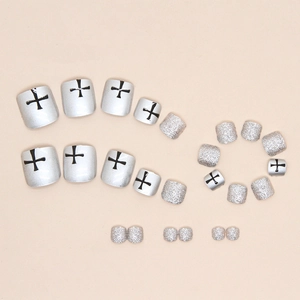Silver metallic and glitter press-on toenails with black cross design in 24 pieces set