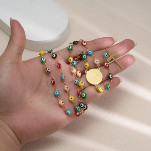 Colorful Evil Eye rosary necklace with Saint Benedict medal and golden cross pendant