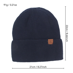 Navy blue winter beanie with leather label showing dimensions 21x22cm and 91g weight