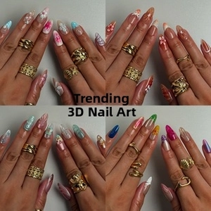 Detail of 3D embossed long almond press-on nails with various floral and textured designs