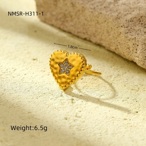 Detail shot of golden hammered heart ring with star crystal, size 1.8cm, weight 6.5g