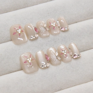 Handmade orchid press-on nails with pink flowers and 3D butterfly charms set of 10