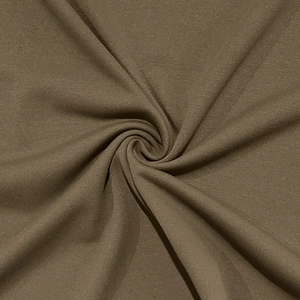 Macro detail of brown Henley shirt fabric showing soft texture and fine twill weave pattern
