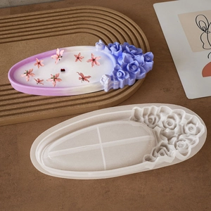 Detailed macro view of oval silicone mold with embossed roses for DIY resin tray projects
