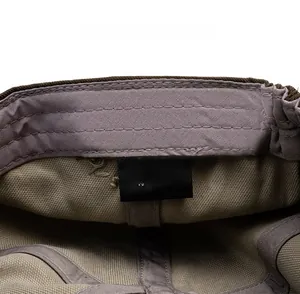 Detailed care label showing 55% Tencel and 45% cotton blend on newsboy hat interior